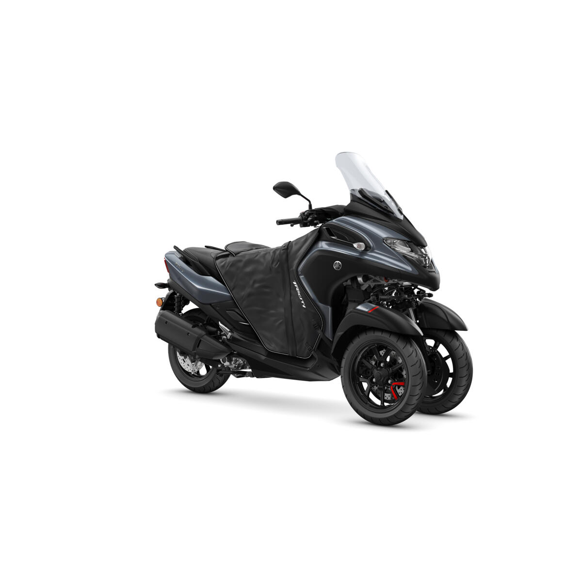 With its 3-wheel layout, the Tricity 300 gives a new feeling of stability and confidence, making it an ideal vehicle for year round riding, even in cold and bad weather. So now you’ve got a scooter that you can use in a range of conditions, we thought we’d create the Winter Pack featuring a water-resistant apron as well as handlebar grips heater. Available now from your Yamaha dealer who will be happy to fit these high quality Genuine Accessories to your Tricity 300.